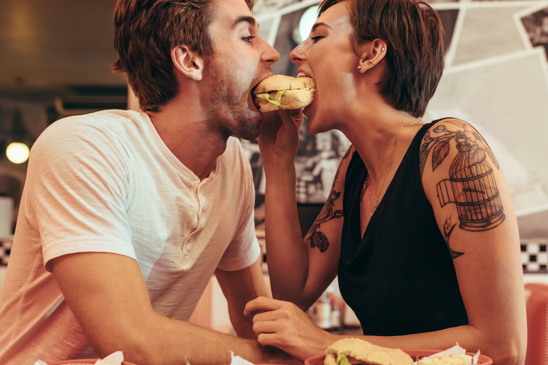 Joyful female foodie discovering love on a culinary dating platform, connecting with fellow gourmands who enjoy exploring new restaurants, cooking adventures, and shared passion for delicious food.